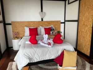 Postel nebo postele na pokoji v ubytování Balú Glamping