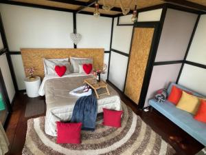 Postel nebo postele na pokoji v ubytování Balú Glamping