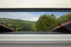 a view from a car window of a vineyard at Hotel Boutique Berazadi Berri in Zarautz