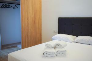 Ένα ή περισσότερα κρεβάτια σε δωμάτιο στο Aptartamento Descanso de Hércules - Galitrips