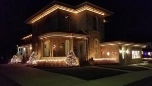a house with christmas lights on the front of it at HA Whitney Inn in Columbus