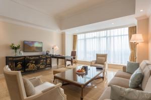 Posezení v ubytování Qingdao Jianxin International Hotel