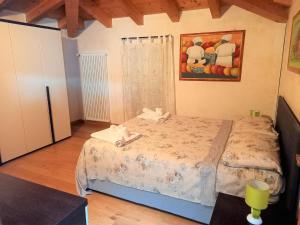 Posteľ alebo postele v izbe v ubytovaní Villa in Italy with Lake Views and Pool