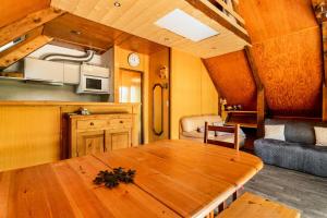 Η κουζίνα ή μικρή κουζίνα στο Chalet à l'ambiance cocooning à Vars - maeva Home - Chalet 2 pièces 9 personnes - Confort MAE-3585