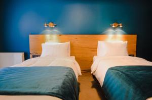 Llit o llits en una habitació de Suatis Resort Kazbegi