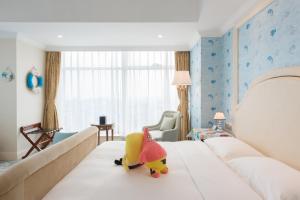 Afbeelding uit fotogalerij van Qingdao Jinshi International Hotel in Qingdao