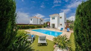 Πισίνα στο ή κοντά στο Ayia Napa Holiday Villa 036