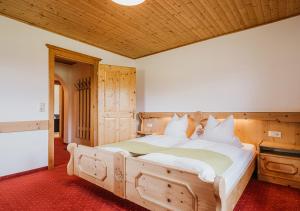 Tempat tidur dalam kamar di Hoferhof