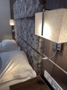Postel nebo postele na pokoji v ubytování Park Hotel