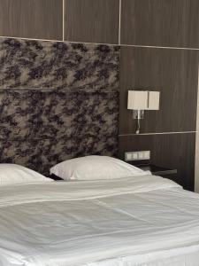 Postel nebo postele na pokoji v ubytování Park Hotel