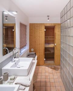 Ванная комната в Ferienhaus Seehaus Sylt - Urlaubszauber in den Dünen mit fantastischem Meerblick