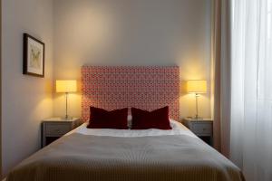 Postel nebo postele na pokoji v ubytování Elite Stadshotellet Västerås