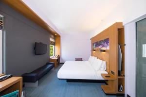 En eller flere senger på et rom på Hotel Halez