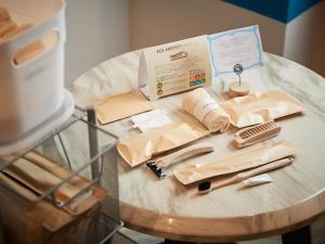a glass table with items on top of it at Glory island okinawa SOBE in Naha