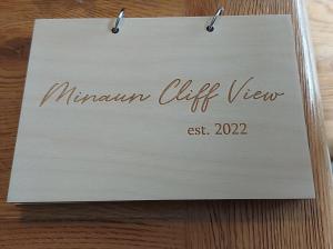 Majutusasutuses Minaun Cliff View olev sertifikaat, autasu, silt või muu dokument