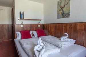 Postel nebo postele na pokoji v ubytování Hotel Le Refuge