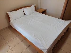 Postel nebo postele na pokoji v ubytování Wellness & Spa Hotel ACD Annex