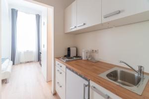 Una cocina o kitchenette en Centre Apartments