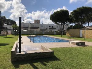 Bazén v ubytování Adosado La Fresca by Rental Olé nebo v jeho okolí