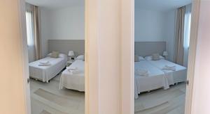 Łóżko lub łóżka w pokoju w obiekcie AZAHAR BEACH Red Apartments & Spa
