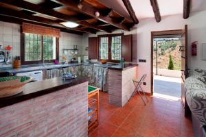 A kitchen or kitchenette at Casita T