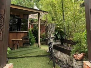 Κήπος έξω από το RUMAPOKO Guesthouse