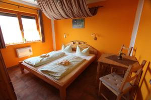 Katil atau katil-katil dalam bilik di Naturcamp Duvendiek Pension