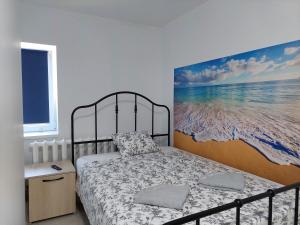 Postel nebo postele na pokoji v ubytování Vila de pe Lac Amara