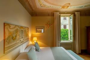 เตียงในห้องที่ Villa delle Palme