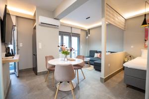 A seating area at Evaggelismos m station studio for 3 pers by MPS