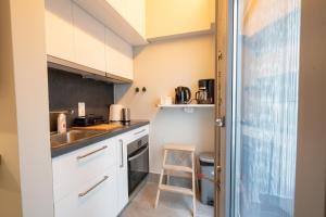 A kitchen or kitchenette at Evaggelismos m station studio for 3 pers by MPS Még 27 kép