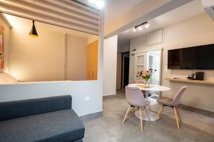A television and/or entertainment centre at Evaggelismos m station studio for 3 pers by MPS