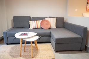 A seating area at Evaggelismos m station studio for 3 pers by MPS