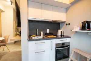 A kitchen or kitchenette at Evaggelismos m station studio for 3 pers by MPS