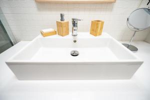 A bathroom at Evaggelismos m station studio for 3 pers by MPS