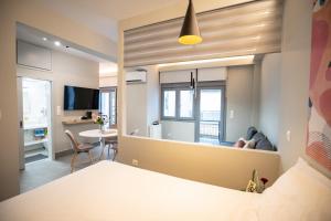 A television and/or entertainment centre at Evaggelismos m station studio for 3 pers by MPS