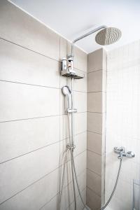 A bathroom at Evaggelismos m station studio for 3 pers by MPS