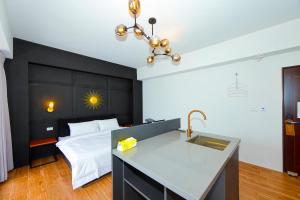 Voodi või voodid majutusasutuse Shui Shang Yuan Homestay toas