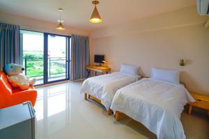 Voodi või voodid majutusasutuse Shui Shang Yuan Homestay toas