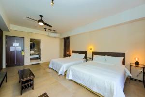 Voodi või voodid majutusasutuse Shui Shang Yuan Homestay toas