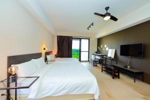 Voodi või voodid majutusasutuse Shui Shang Yuan Homestay toas