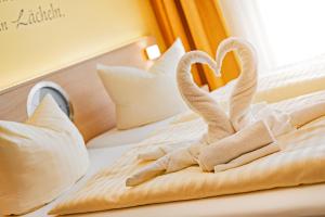 Ένα ή περισσότερα κρεβάτια σε δωμάτιο στο Aparthotel Strandhus
