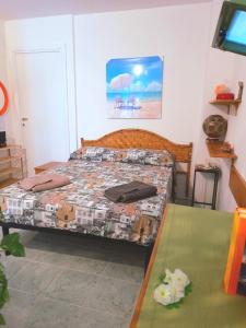 Postel nebo postele na pokoji v ubytování LA QUERCIA SUITES - taverna nel borgo medievale + 24 fotografií