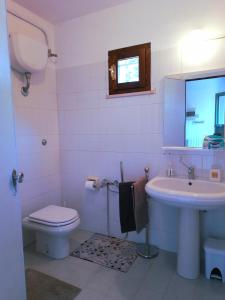 Koupelna v ubytování LA QUERCIA SUITES - taverna nel borgo medievale