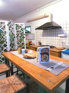 Köök või kööginurk majutusasutuses LA QUERCIA SUITES - taverna nel borgo medievale