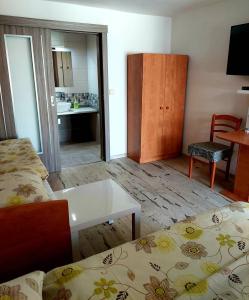 Posteľ alebo postele v izbe v ubytovaní Hotel Olga