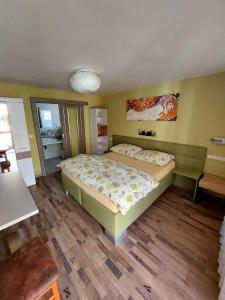 Posteľ alebo postele v izbe v ubytovaní Hotel Olga
