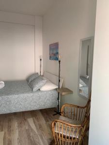 Postel nebo postele na pokoji v ubytování Aria di mare