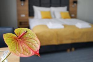Posteľ alebo postele v izbe v ubytovaní FACTORY RESORT wellness & spa + 37 fotografií