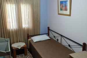 Postel nebo postele na pokoji v ubytování Sofia's House